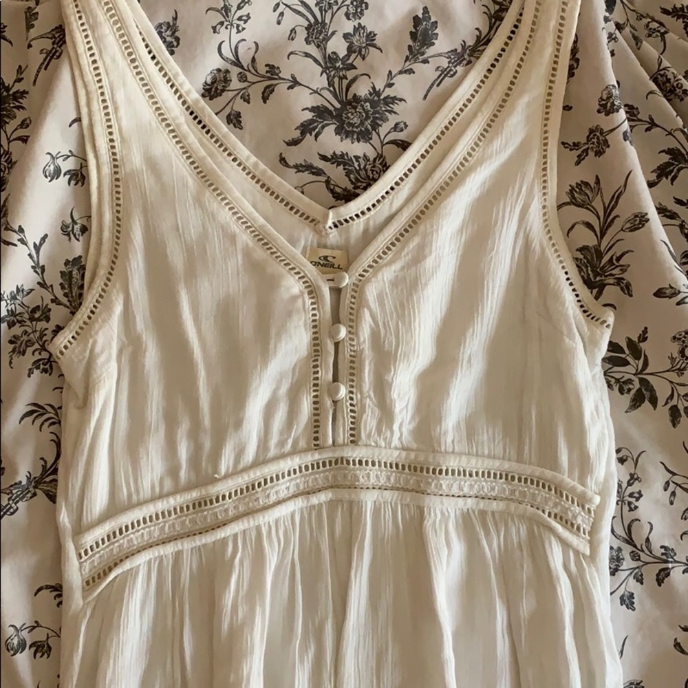 White dress with croquet detail